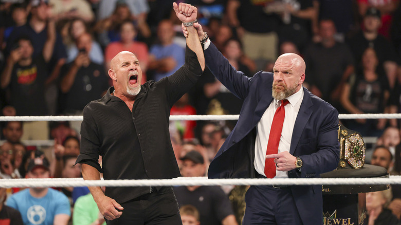 Goldberg with Triple H in WWE