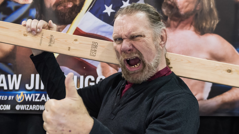 WWE Legend "Hacksaw" Jim Duggan poses with his 2x4 during a convention appearance.