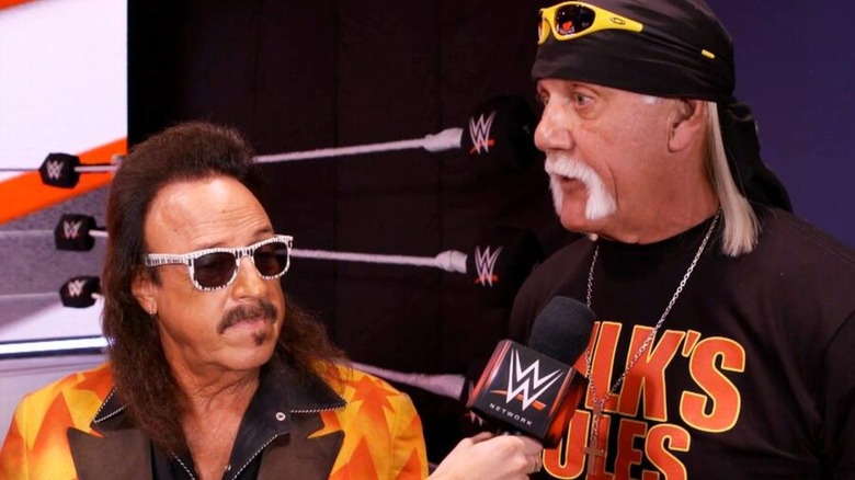 Jimmy Hart and Hulk Hogan talking