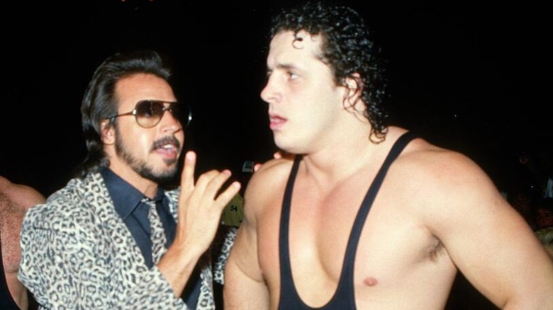 Jimmy Hart speaking to Bret Hart in ring ahead of a match.