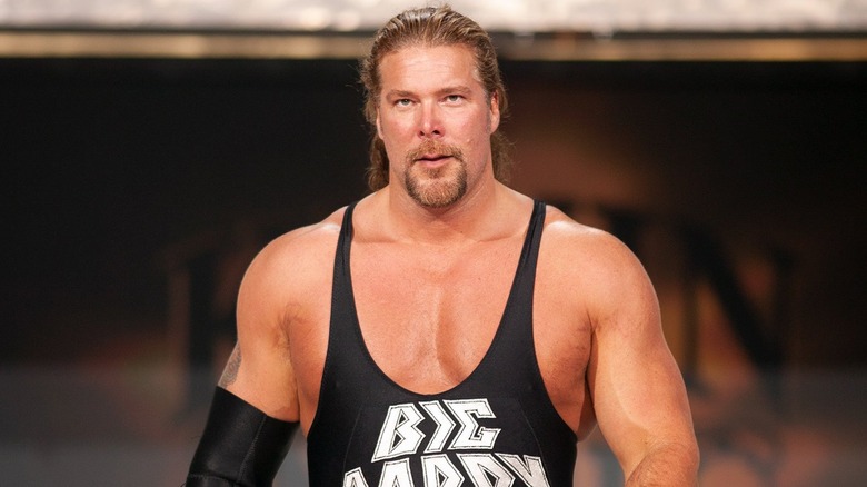 Kevin Nash walking to the ring in a singlet