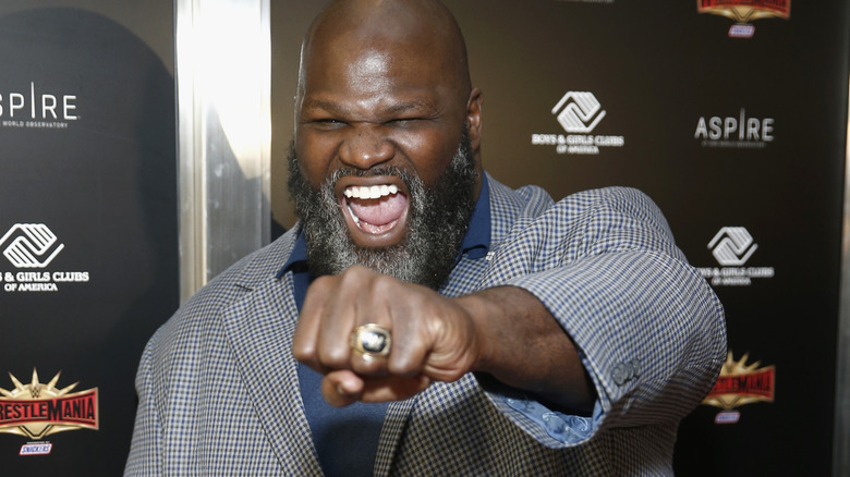 Mark Henry smiling with his fist out