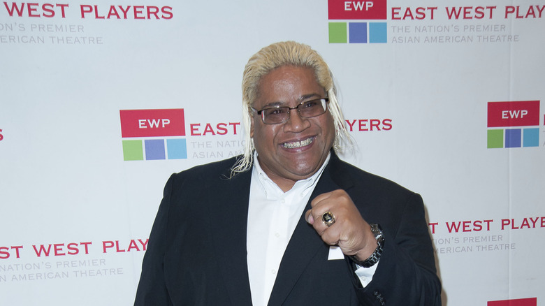 Rikishi smiling