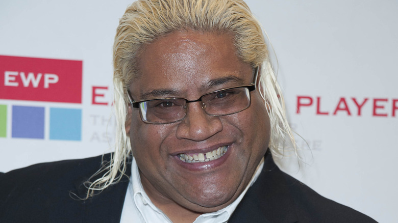 Rikishi smiling