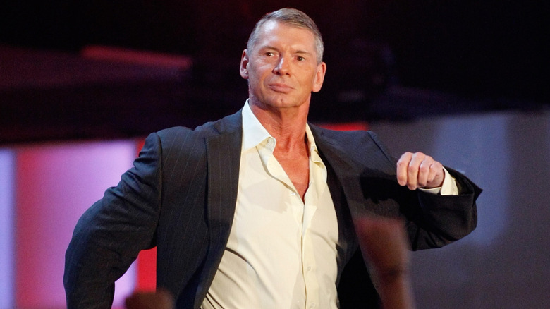 Vince McMahon doing his signature strut to the ring during an episode of 