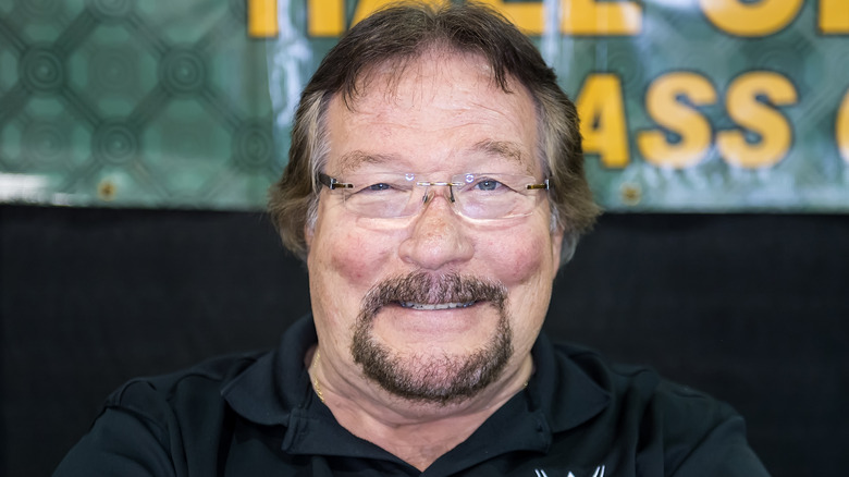 Ted DiBiase smiling for a photo
