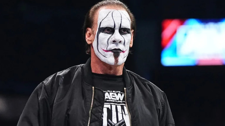 Sting wearing black and white face paint 