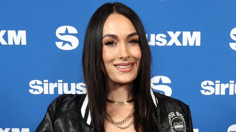 Brie Bella poses for a photo at SiriusXM on Radio Row