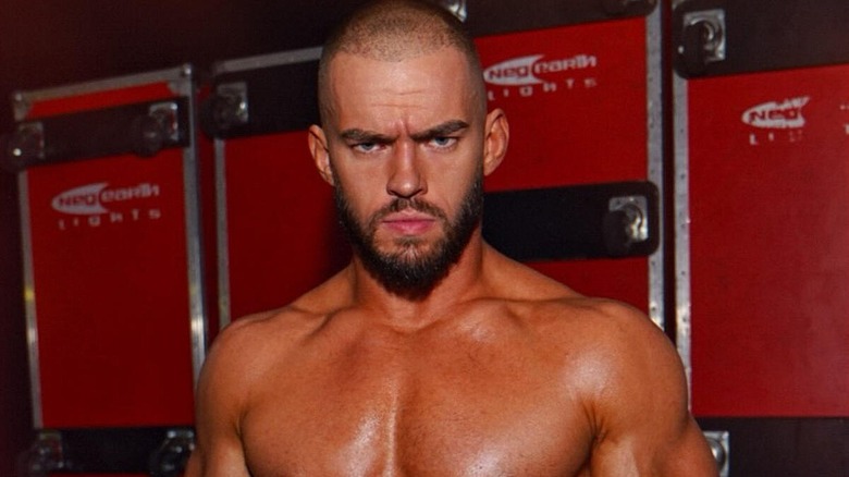 Austin Theory backstage at a WWE show.