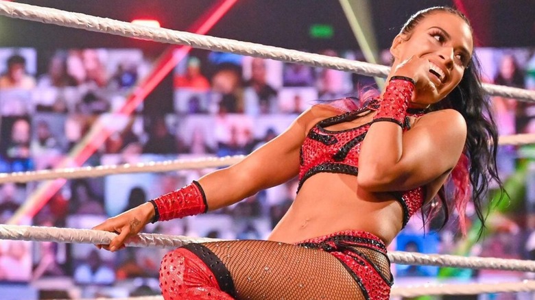 Zelina Vega poses on the ramps and looks toward the hard cam before a match during the 