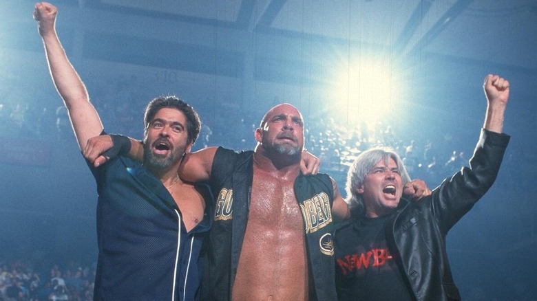 Eric Bischoff and Vince Russo pose with Goldberg at a time when things were looking up for WCW