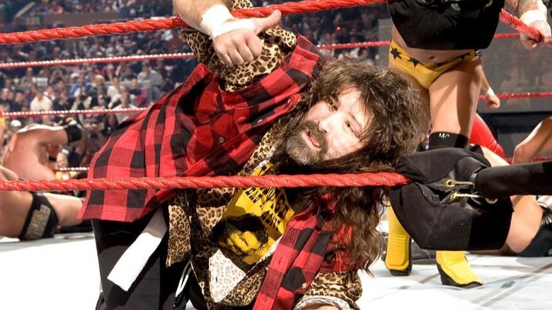 Hall of Famer Mick Foley takes a breather and gives a thumbs up in the corner during a battle royal event
