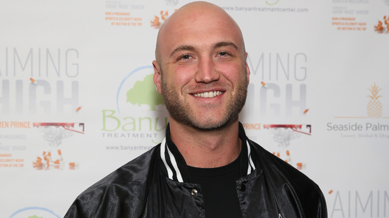 Nick Hogan is smiling