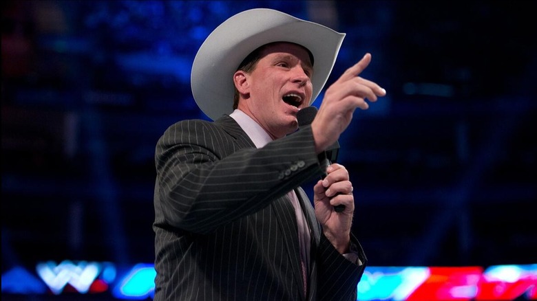 WWE Hall of Famer JBL speaks to the crowd in the center of the ring