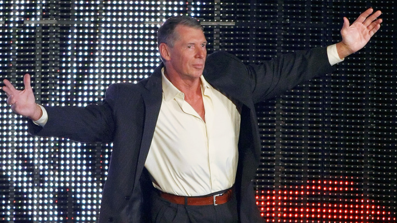 Former WWE CEO and Chairman Vince McMahon dances at the top of an entrance ramp