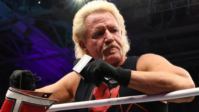 Jeff Jarrett leaning against the ring ropes