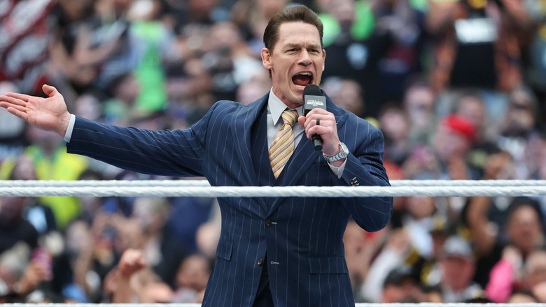 John Cena beckons the crowd while hosting WrestleMania 42, April 2026.