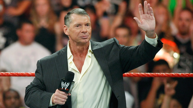 Former WWE CEO and Chairman Vince McMahon waves out to the crowd