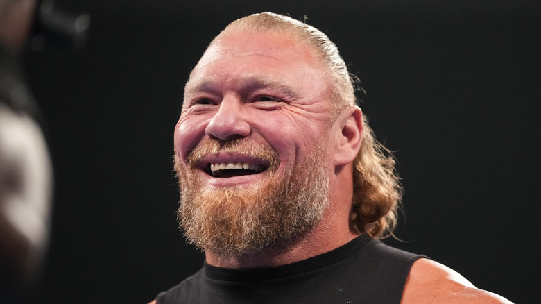 Brock Lesnar smiling on WWE SmackDown