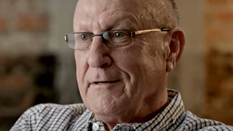 Earl Hebner wearing glasses