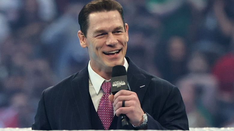 John Cena holding a microphone