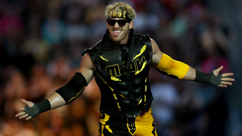 Logan Paul wearing black and yellow wrestling gear in WWE