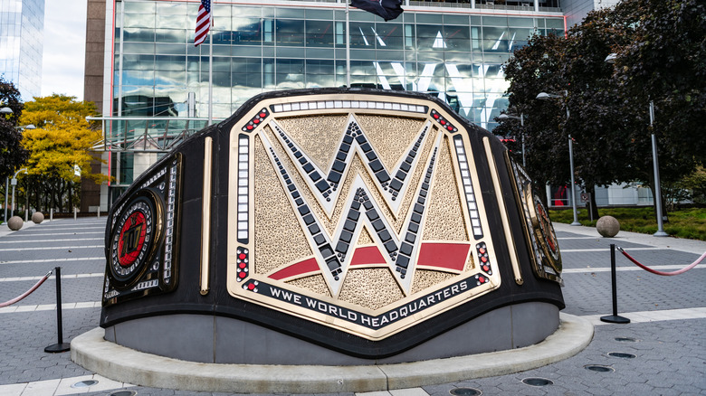 WWE Universal Championship belt sculpture. WWE logo. Main headquarters in US. WWE World Wrestling Entertainment