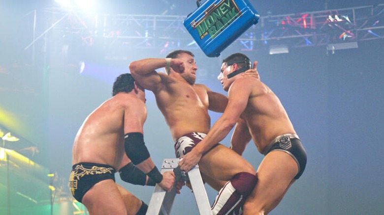 Daniel Bryan fights Cody Rhodes and Wade Barrett atop a ladder