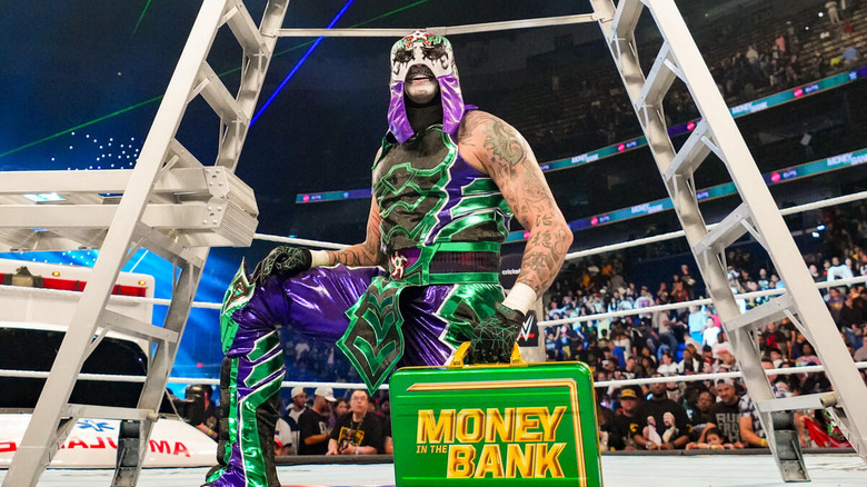 Penta celebrates with the Money In The Bank briefcase