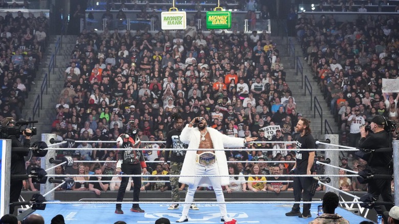 Trick Williams, Penta, Je'Von Evans and Sami Zayn in the ring