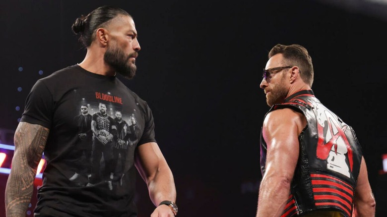 World Heavyweight Champion Roman Reigns and LA Knight stare one another down during a promo segment on the October 5, 2026 edition of "WWE Raw."