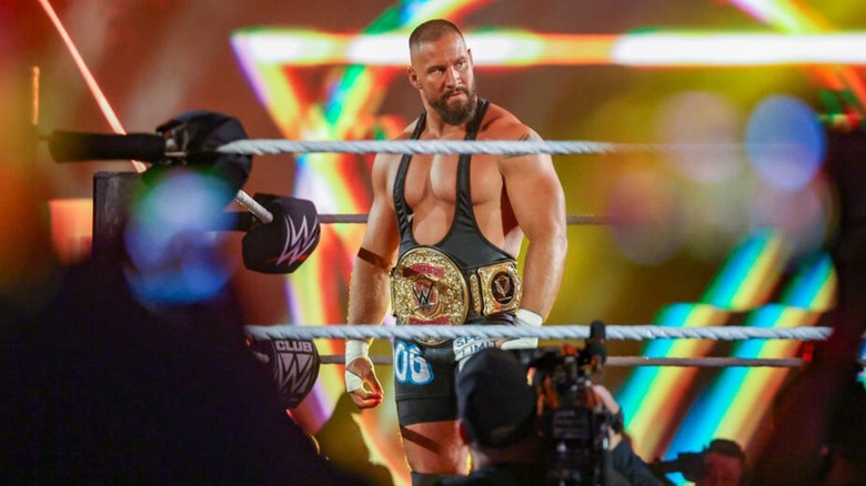 Bron Breakker stands in the ring, tag team championship around his waist, before a match on a September 2026 edition of "WWE Raw."