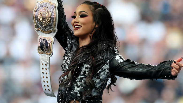Roxanne Perez holding the WWE Women's Tag Team Championship