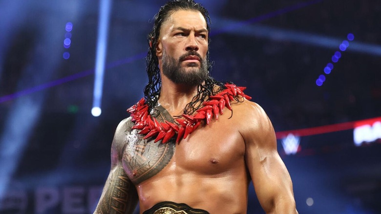 World Heavyweight Champion Roman Reigns stands in the ring, ula fala around his neck, before his title match against Penta on the September 14, 2026 edition of "WWE Raw" from Mexico City.