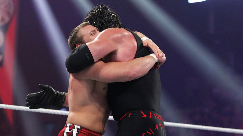 Daniel Bryan and Kane hug in the ring at Night of Champions 2012