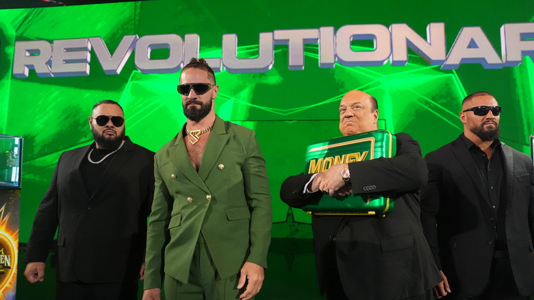 Seth Rollins, Bronson Reed, Paul Heyman and Bron Breakker make their WWE entrance  and head to the ring