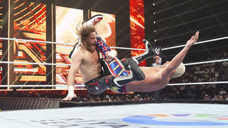 Sami Zayn hits Cody Rhodes with a Blue Thunder Bomb