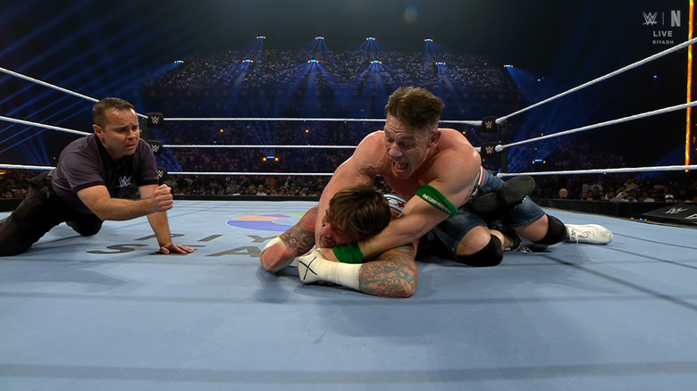 Cena with the STF locked in on Punk
