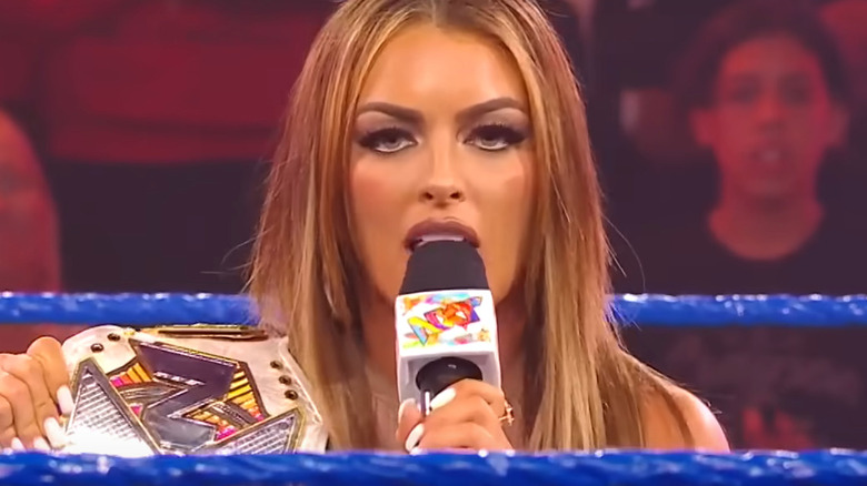 Mandy Rose speaking into a microphone