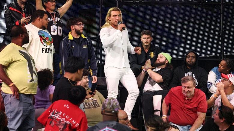 Tristan Angels makes his entrance through the Performance Center crowd during his debut on "WWE NXT."