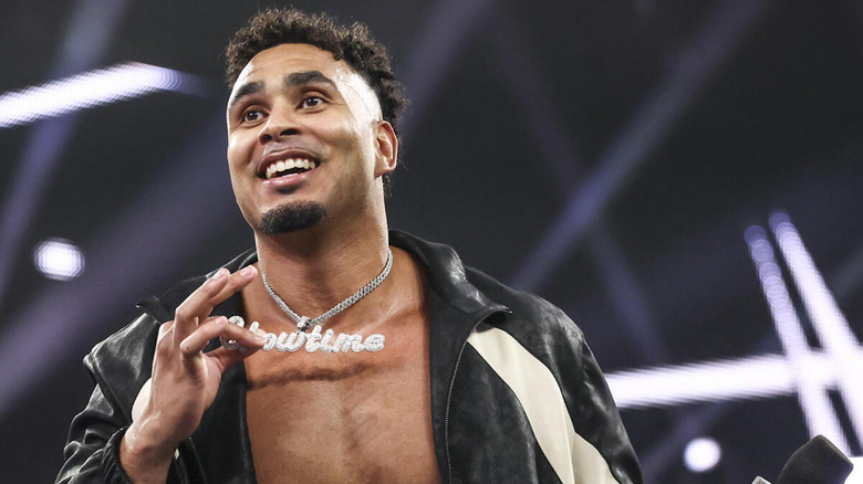 Kam Hendrix shows off his necklace