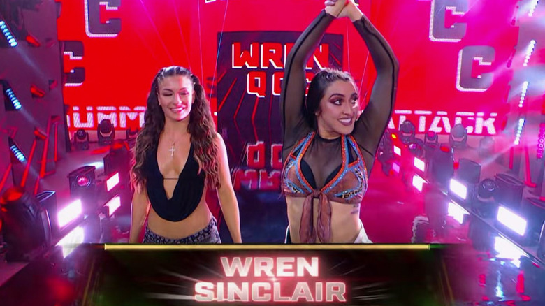 Wren Sinclair raising her arms