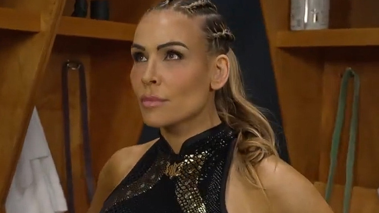 WWE star Nattie wearing a black tank top