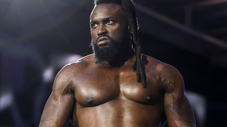 Keanu Carver stares down the ramp from the ring ahead of a match on "WWE NXT."