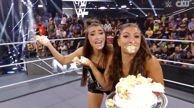 Kendal Grey and Wren Sinclair eat cake