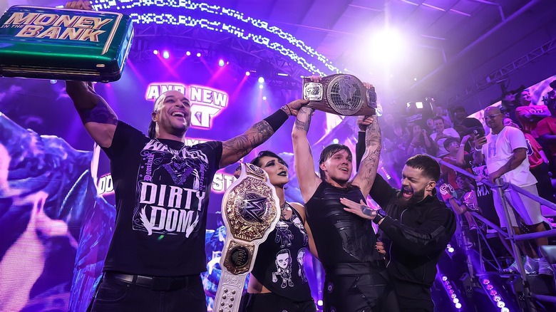 Dominik Mysterio celebrates with The Judgment Day