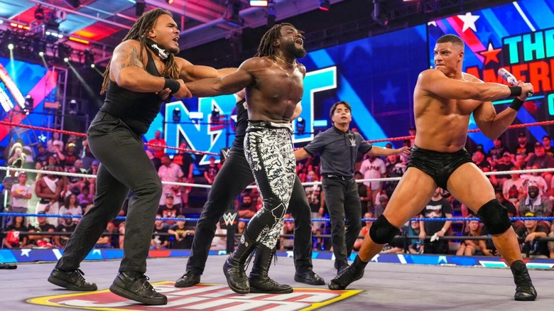 Osiris Griffin and Cutler James hold back Saquon Shugars as Dion Lennox goes to hit him with a bat, following Shugars' victory at "WWE NXT" Great American Bash 2026.