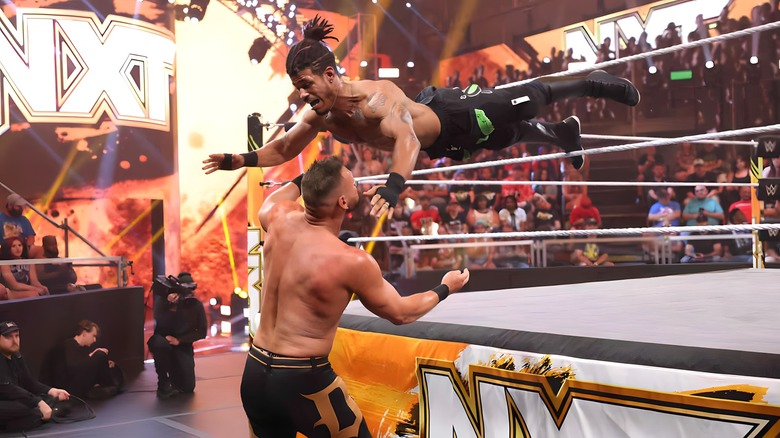 Wes Lee with a suicide dive on Dijak