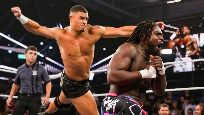 Dion Lennox looks to hit Saquon Shugars with a lariat to the back during a match on "WWE NXT."