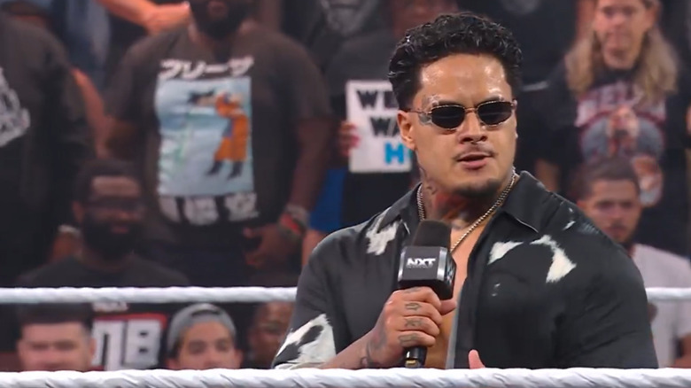 Zilla Fatu on the microphone in the ring
